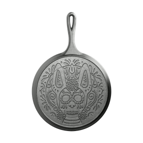 Lodge cast iron griddle with XOLO SUGAR SKULL
