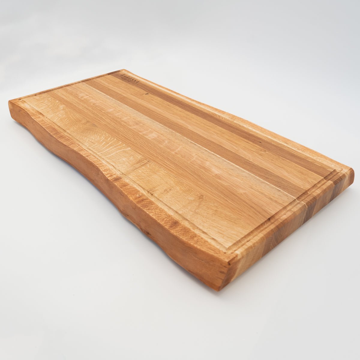BABOSSA | Eichen Schneidebrett XL | Naturkante | Saftrille | 70x40x6 cm - Grillstar.deBABOSSA | Eichen Schneidebrett XL | Naturkante | Saftrille | 70x40x6 cmHolzbrettBABOSSAGrillstar.de